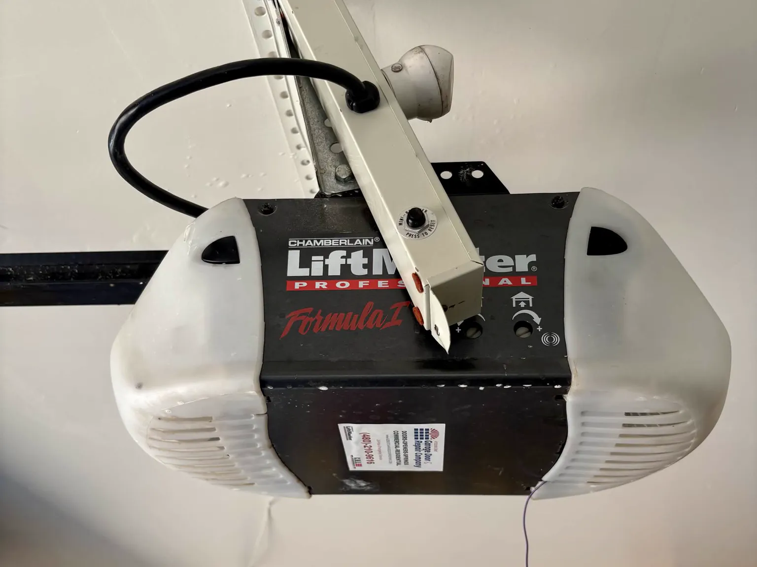 Before: aging Chamberlain LiftMaster Formula I garage door opener in Mesa