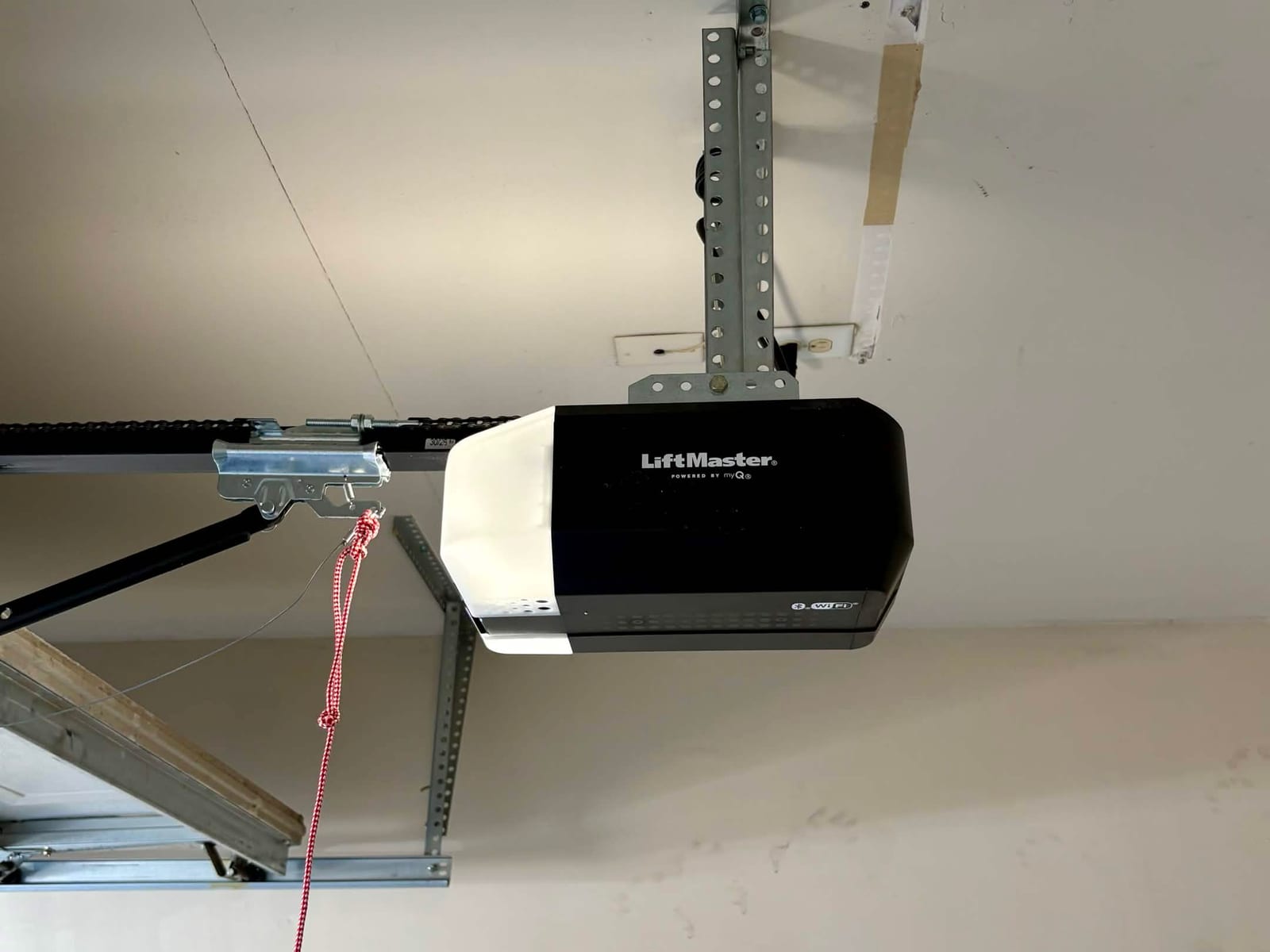 After: new quiet DC chain-drive garage door opener installed on the rail in Phoenix